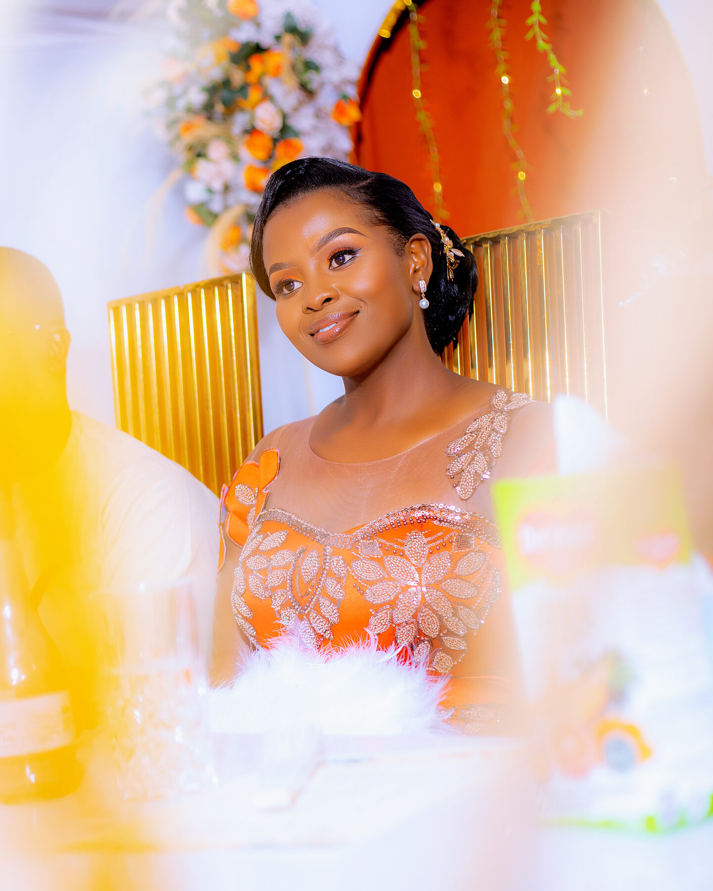 Luxury ruracio bride in orange traditional attire Kenya